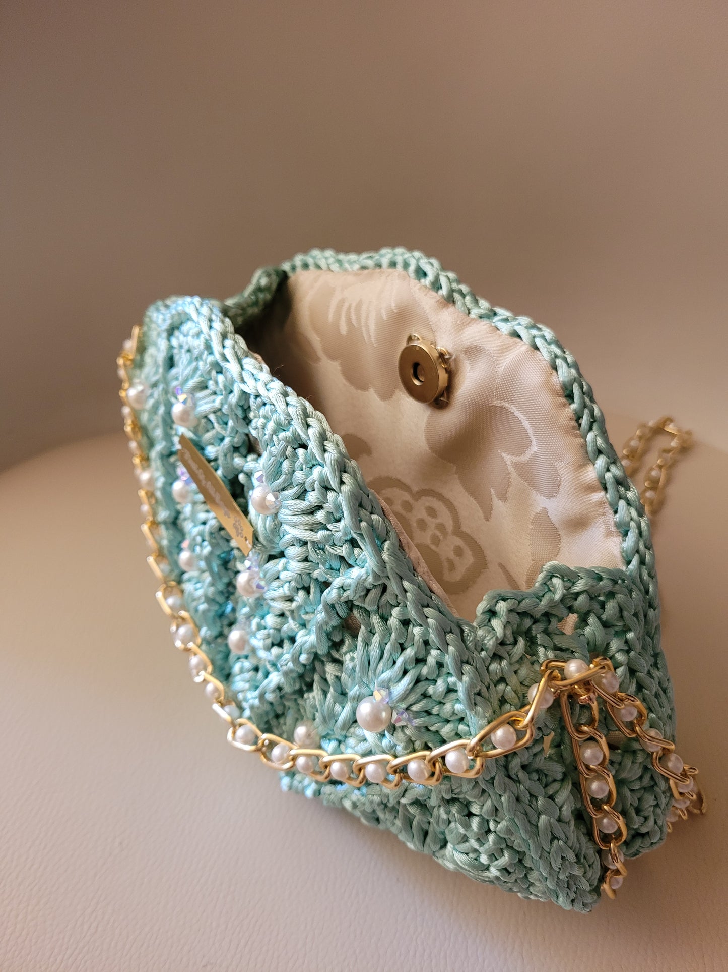 Pochette acquamarina