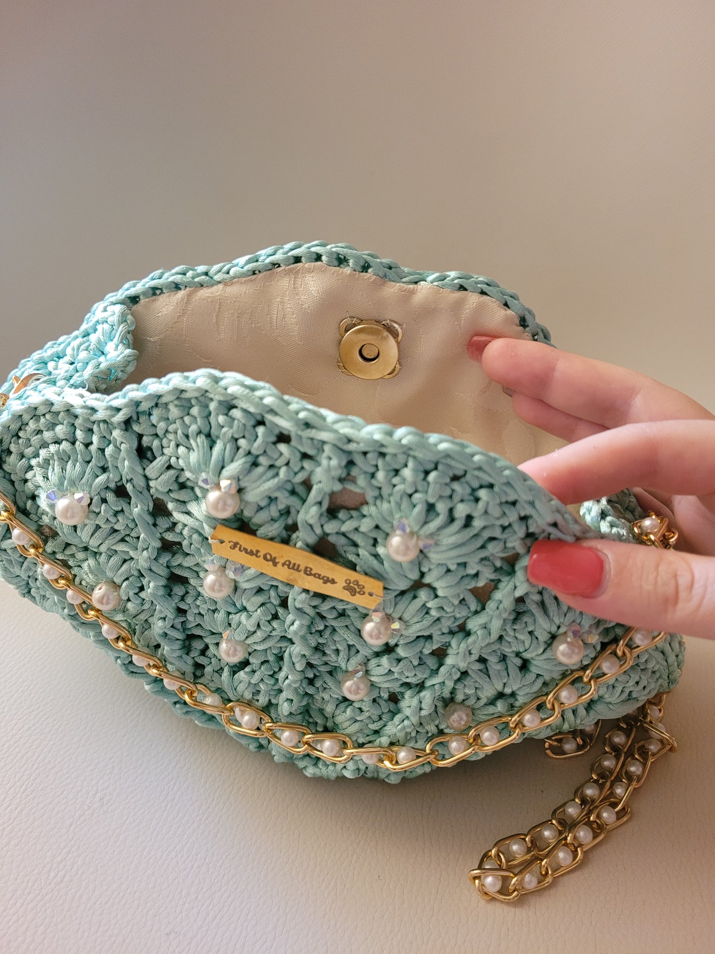 Pochette acquamarina